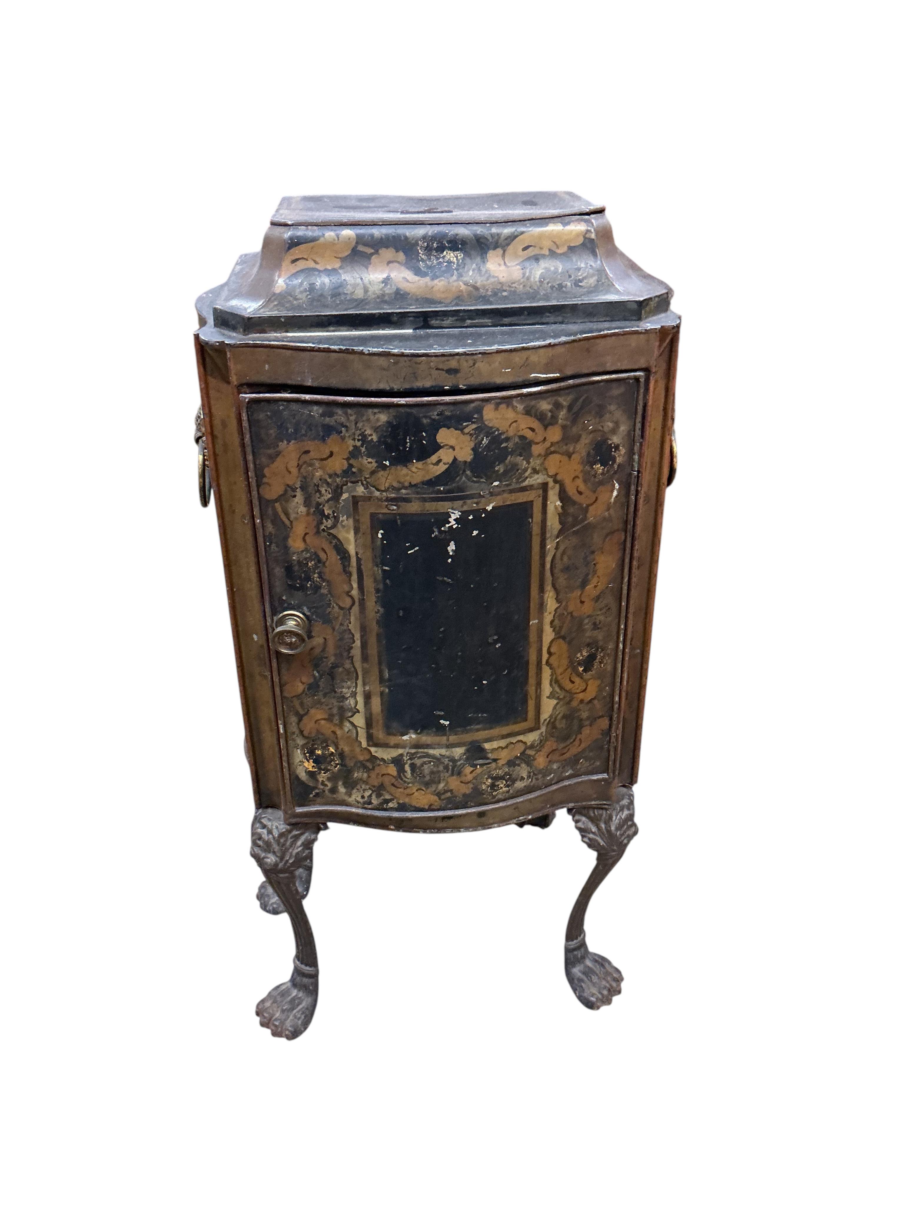 An early 19th century toleware serpentine cabinet, with gilt decoration, width 40cm, depth 30cm, height 76cm